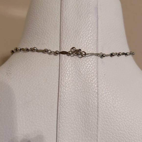 Stunning silver choker style necklace. Perfect accent piece for any outfit! - Picture 5 of 11
